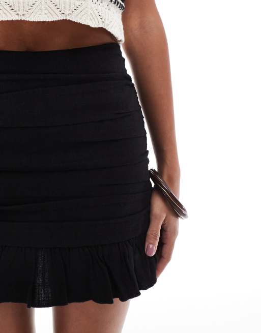 Stradivarius ruched mini skirt in black