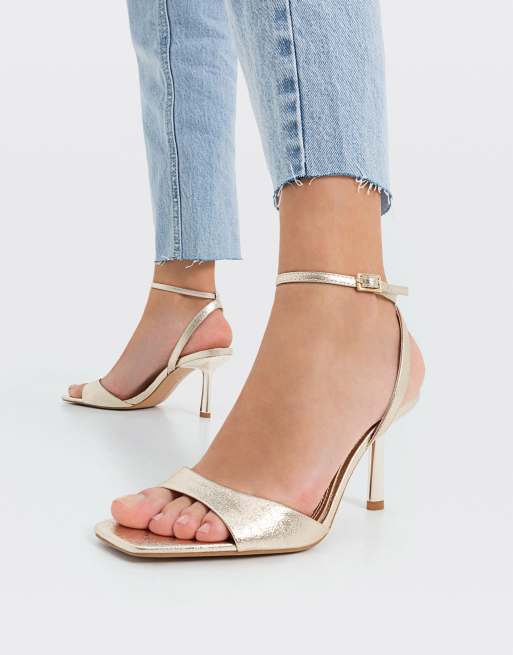 Stradivarius - Sandalen met hak en bandjes in lichtgoud