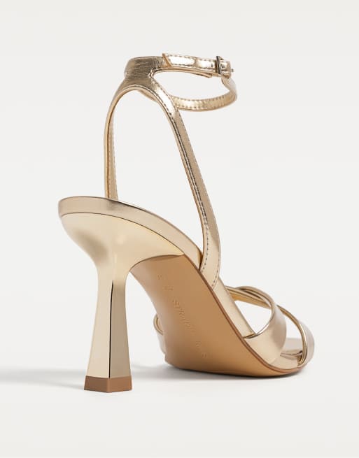 Stradivarius Sandali con tacco a spillo color oro a pianta larga