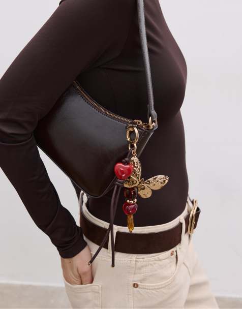 Stradivarius – Schlüsselanhänger in Braun mit Schmetterling - view 1