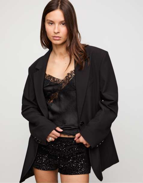 Stradivarius Sequinned mini shorts in black - view 1
