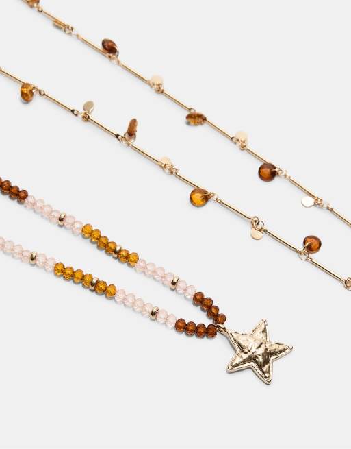 Stradivarius - Set con 2 collane color oro con perline e stella