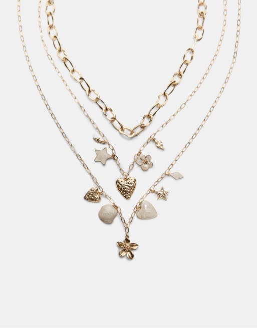 Stradivarius - Set con 3 collane color oro con charm smaltati