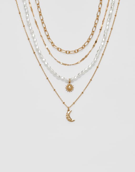 Stradivarius - Set con 4 collane color oro con luna e sole