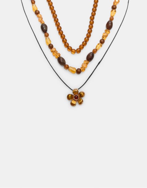 Stradivarius - Set da 3 collane con perline e fiore color senape - view 1