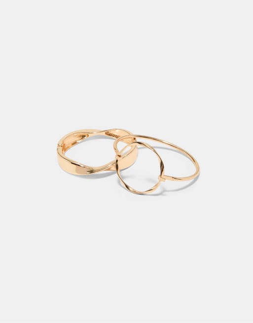Stradivarius set med 2 vågiga stela armband i guld, 4 av 4