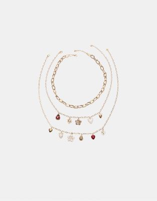 Stradivarius - Set mit 3 Halsketten mit mehreren Anhängern in Gold-Optik-Gelb