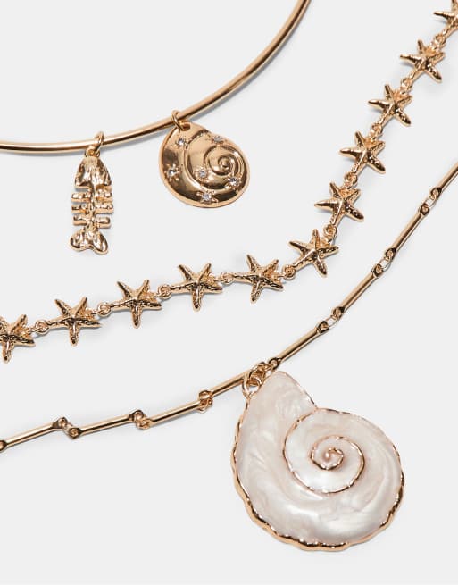 Stradivarius – Set mit 3 Halsketten mit Muschel-Anhängern in Goldoptik, 2 von 4