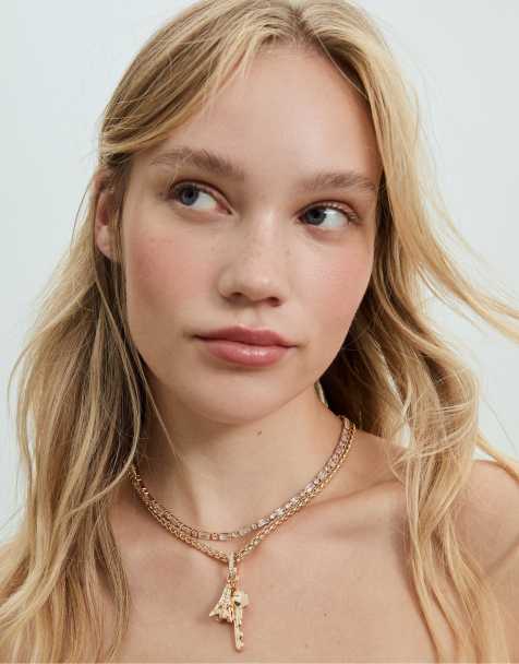 Stradivarius Set of 2 rhinestone and multi-charm necklaces in gold - view 1