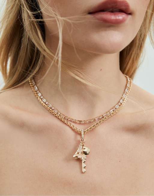 Stradivarius Set of rhinestone and multi-charm necklaces in gold