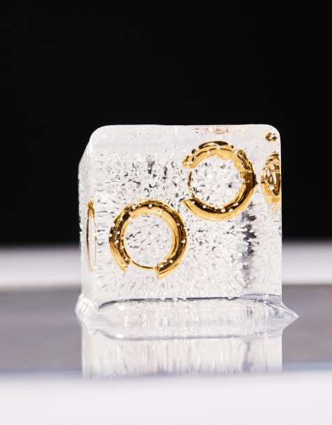 Stradivarius Set of 2 waterproof hoop earrings in yellow - view 1