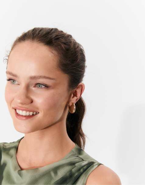 Stradivarius Set of 3 pairs of star earrings in mustard - view 1