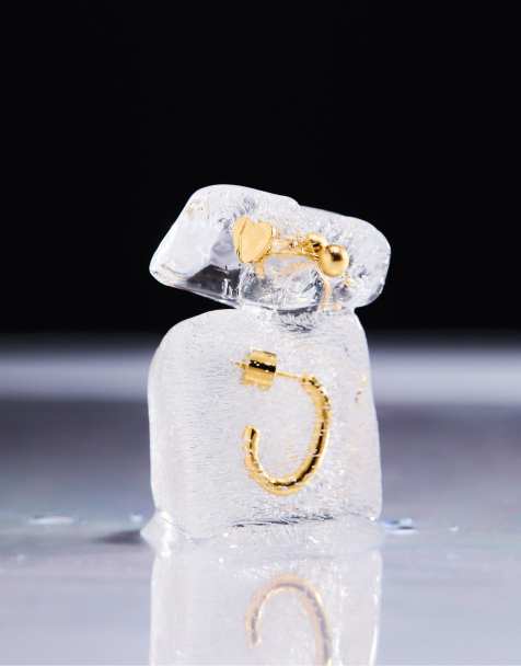 Stradivarius - Set van 4 waterbestendige piercing oorbellen in geel - view 1
