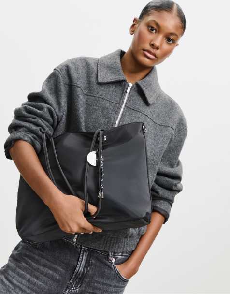Stradivarius – Shopper-Tasche aus Stoff in Schwarz mit Taschenanhänger - view 1