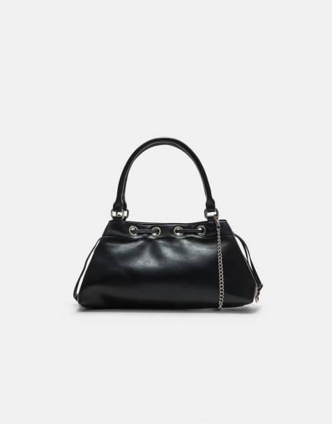 Stradivarius Shoulder bag with eyelets in black - view 1