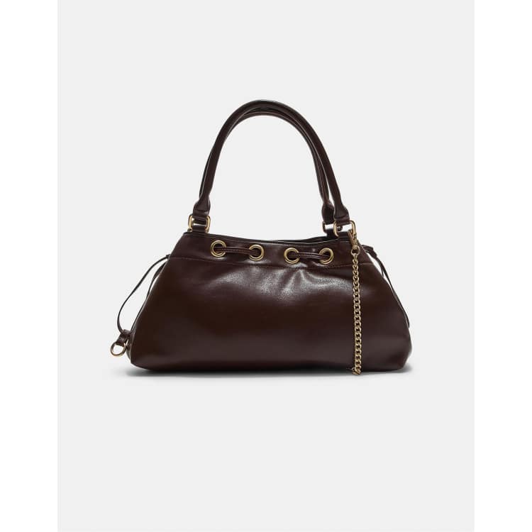 Stradivarius Shoulder bag with eyelets in brown