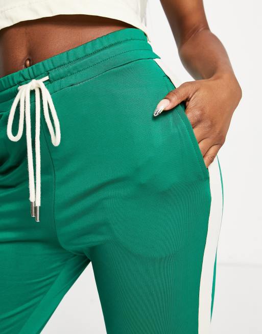 Green joggers with white hot sale stripe