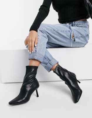 Stradivarius skinny heeled boots in black | ASOS