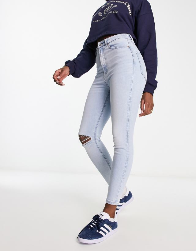 Stradivarius skinny jeans with rip in light blue