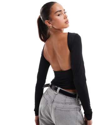 slash neck open back long sleeve top in black