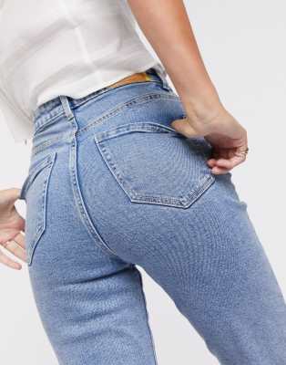 Stradivarius - Slim-fit elastische mom jeans in blauwe wassing | ASOS