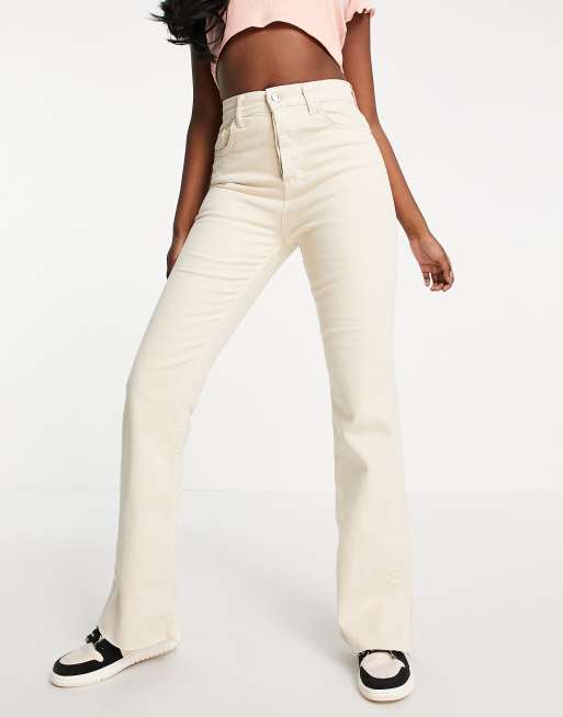 Stradivarius Tall stretch flare jeans with split detail in light