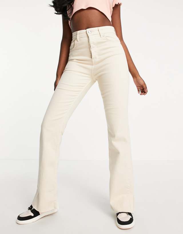 Stradivarius slim flare jeans with split detail in ecru