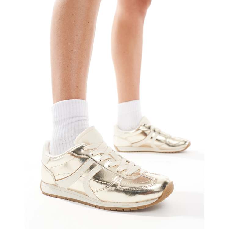 Stradivarius Sneakers color oro ASOS