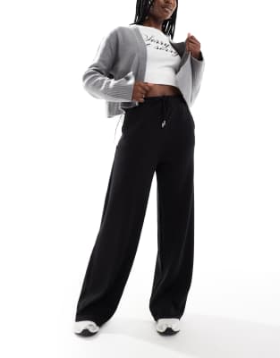 soft touch flare sweatpants in black