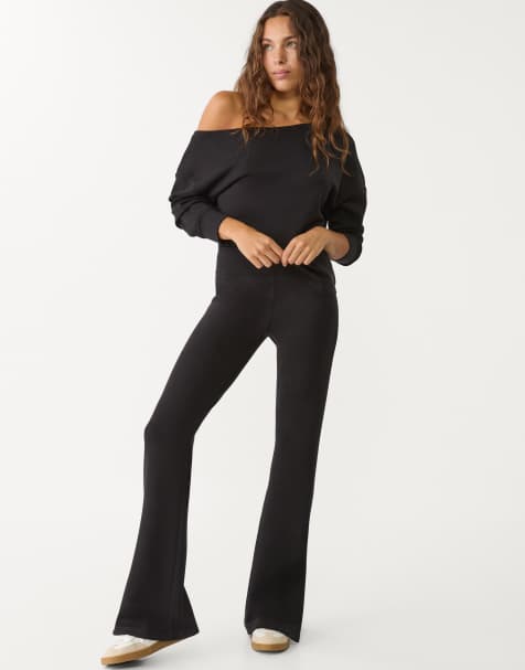Stradivarius soft touch flared trousers in black