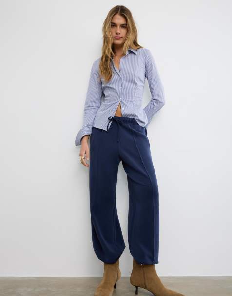 Stradivarius Soft-touch wide-leg jogger trousers with front seam detail in navy blue - view 1