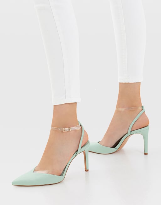 Stradivarius – Spitze Absatzschuhe in Grün mit transparentem Knöchelriemen
