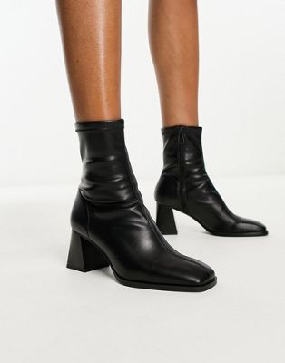 Stradivarius square toe flared heel boot in black | ASOS