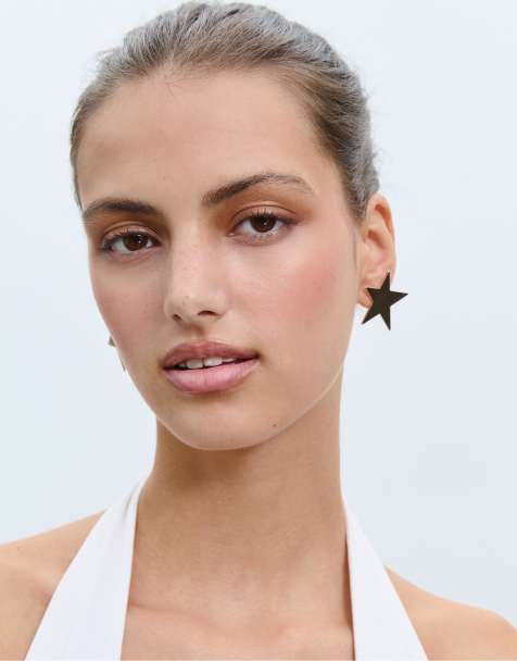 Stradivarius Star earrings in gold - view 1