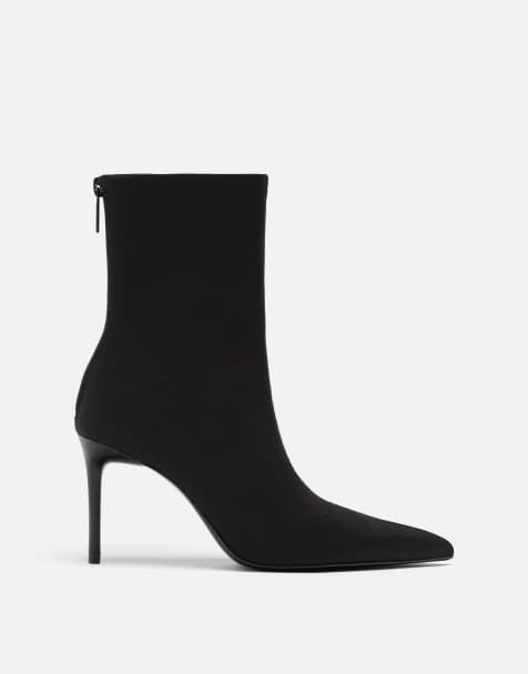 Stradivarius Stiletto heel ankle boots in black - view 1
