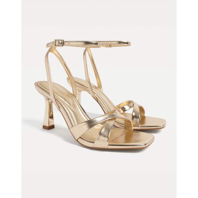 Stradivarius stiletto heel sandals in gold | ASOS