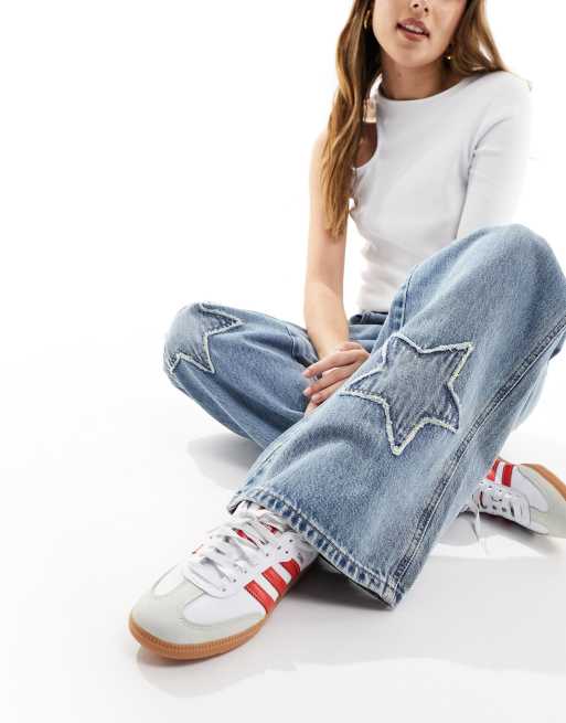 Jean ecusson femme sale