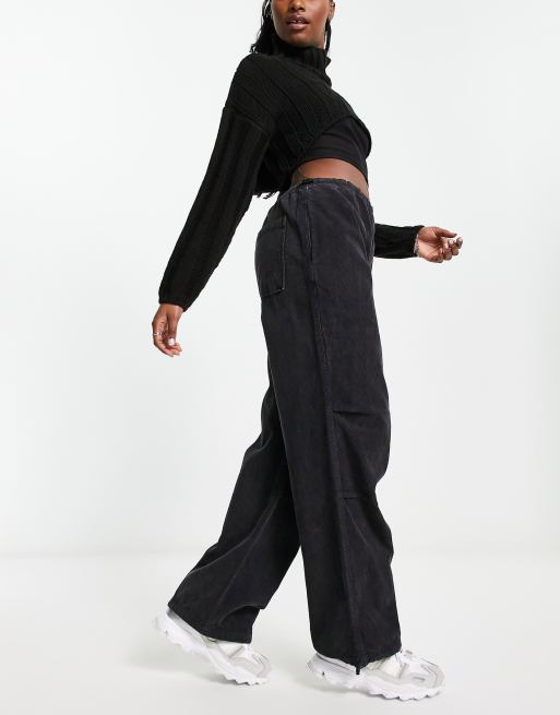 Stradivarius STR oversized baby cord parachute pants in black | ASOS