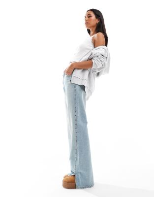 straight leg jeans with studs in light blue