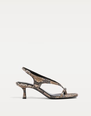  Strappy heeled sandals in combined
