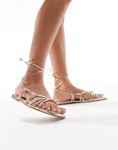 Stradivarius strappy tie flat sandal in gold - view 1