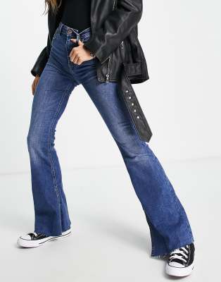 Stradivarius stretch flare jeans with split hem in medium blue