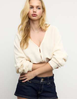 Stradivarius - Strickjacke in Vanille mit Fledermausärmeln-Weiß