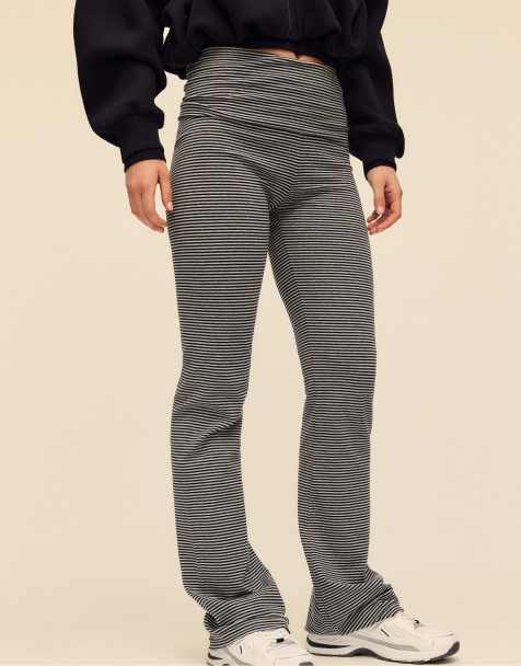 Stradivarius Striped bell bottom leggings in dark grey - view 1