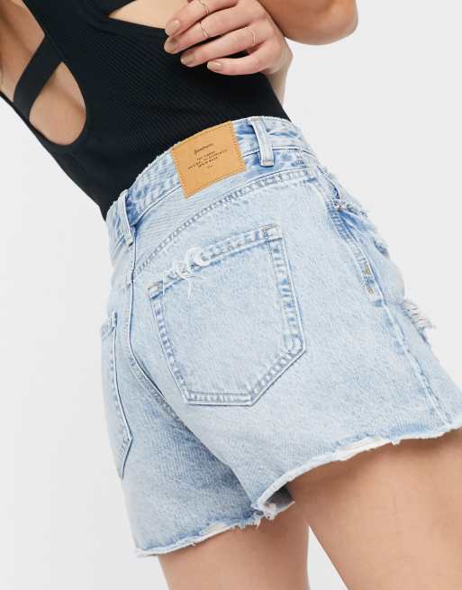 Stradivarius super high waist denim short with rip in light blue