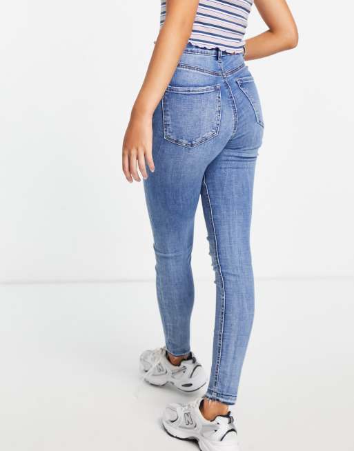 Stradivarius Petite super high waist skinny jean in in light blue