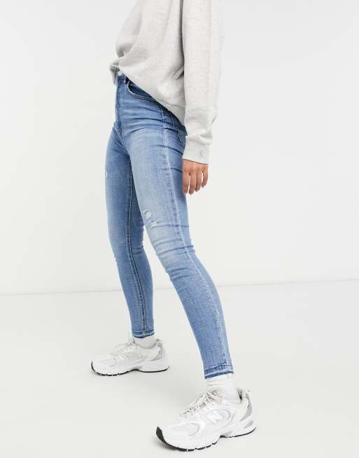 Stradivarius Petite super high waist skinny jeans in light blue