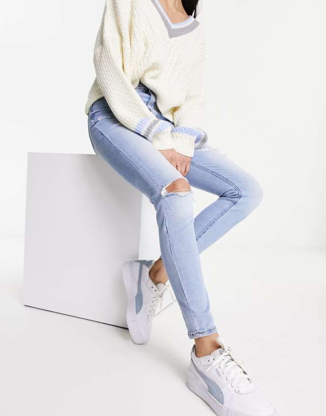 Stradivarius super high waist skinny jean with rip in light blue