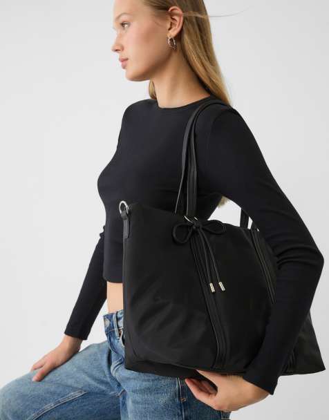 Stradivarius – Svart shoppingväska i tyg med rosettdetalj - view 1