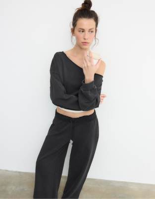 Stradivarius - Sweatshirt in Dunkelgrau mit Print und verwaschener Optik